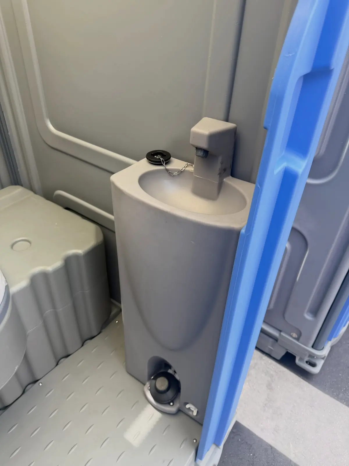 Deluxe unit with a foot-pump sink
