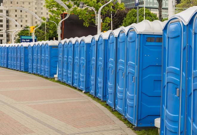 a row of portable restrooms at a fairground, offering visitors a clean and hassle-free experience in germantown